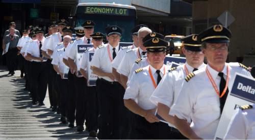 Steve Griffin / The Salt Lake Tribune

About 100 Delta Airlines pilots participate in a national picket to protest salaries at the Salt Lake City International Airport, June 24, 2016.