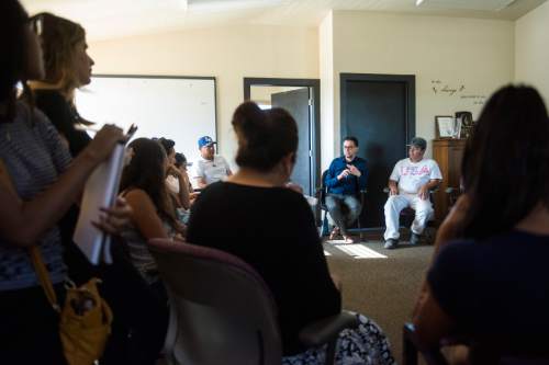 Chris Detrick  |  The Salt Lake Tribune
Executive Director Luis Garza speaks during a community meeting at Communidades Unidas in West Valley City Thursday June 23, 2016.
