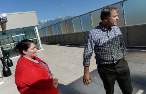 Francisco Kjolseth  |  The Salt Lake Tribune
Midvale homeless shelter family case manager Melissa Meyer and The Road Home Executive Director Matt Minkevitch give a tour of the family shelter that houses 300 people year-round. Maximizing limited space, the roof was converted to a patio that is safe, secure and heated so it can be used in the winter, they said. With so many people crammed in to a tight space, having a place to get some fresh air or have a smoke seems to calm the tensions that can arise.