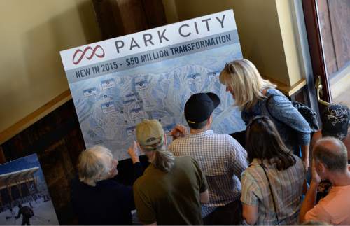 Francisco Kjolseth | Tribune file photo
People gather for the unveiling last year of Park City's new logo, brand, digital presence, signage, uniforms and new trail map that combines Park City Mountain Resort with the Canyons. Owner Vail Resorts has filed to trademark the Park City name, upsetting some residents and businesses.