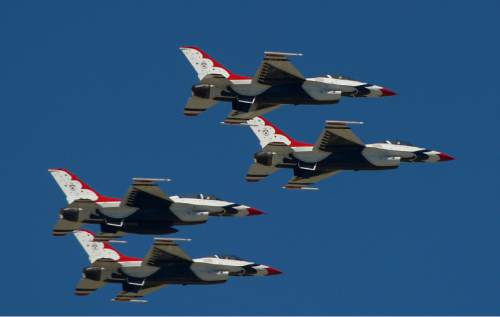 Leah Hogsten  |  The Salt Lake Tribune
U.S. Air Force Air Demonstration Squadron, The Thunderbirds F-16 Fighting Falcons, ended Saturday's show with a demonstration at the 2016 Hill Air Force Base Warriors Over The Wasatch open house and air showJune 2, 2016,