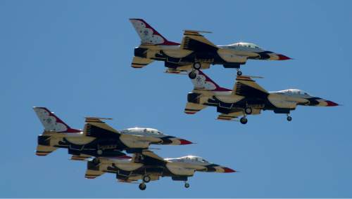 Leah Hogsten  |  The Salt Lake Tribune
U.S. Air Force Air Demonstration Squadron, The Thunderbirds F-16 Fighting Falcons, ended Saturday's show with a demonstration at the 2016 Hill Air Force Base Warriors Over The Wasatch open house and air showJune 2, 2016,