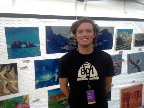 Sean P. Means  |  The Salt Lake Tribune

Salt Lake City artist Chad Farnes, who creates landscapes out of duct tape, stands with his work at his booth at the 2016 Utah Arts Festival.
