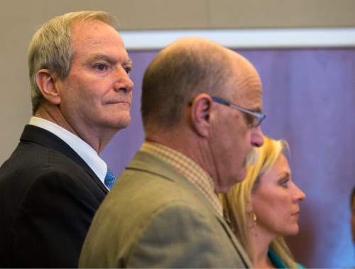 Rick Egan  |  The Salt Lake Tribune

John Martin Carrell stands with his attorney Ron Yengich, as he listens to the jury's verdict, in 3rd District Court in West Jordan, After 16 hours of deliberation over two days, a jury late Thursday afternoon convicted a former Canyons School District bus driver of 19 counts of molesting two of his young female passengers, but found him not guilty of 14 other counts. Carrell, 62, was on trial in 3rd District Court on 33 counts of first-degree felony aggravated sexual abuse of a child. Twenty-three of the counts are tied to alleged acts with the girl in the first of two set of videos. Another 10 counts are related to a second girl. Thursday, July 23, 2015.