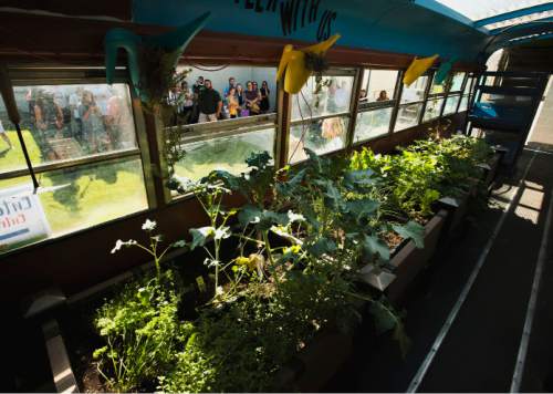 Steve Griffin / The Salt Lake Tribune

A bus filled with produce serves as the backdrop as Mayor Jackie Biskupski and others launch a new mobile farmers market for Glendale and Poplar Grove neighborhoods at the Sorenson Unity Center in Salt Lake City Monday June 27, 2016. The market is designed to help some west side communities access more affordable and healthy food.