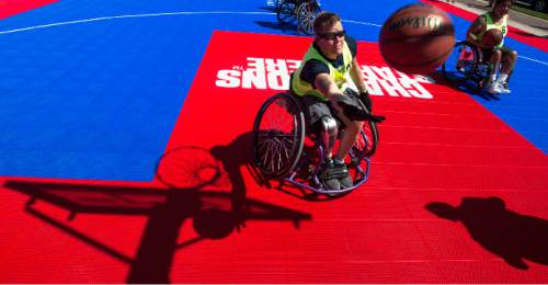 Steve Griffin / The Salt Lake Tribune

Audrey May stretches for a rebound as she warms-up before an exhibition wheelchair basketball game at Vivint SmartHome Arena in Salt Lake City kicking off the 36th National Veterans Wheelchair Games are in Salt Lake City Monday June 27, 2016. This year over 625 athletes from all over the world will converge in Salt Lake City for the games June 27- July 2.