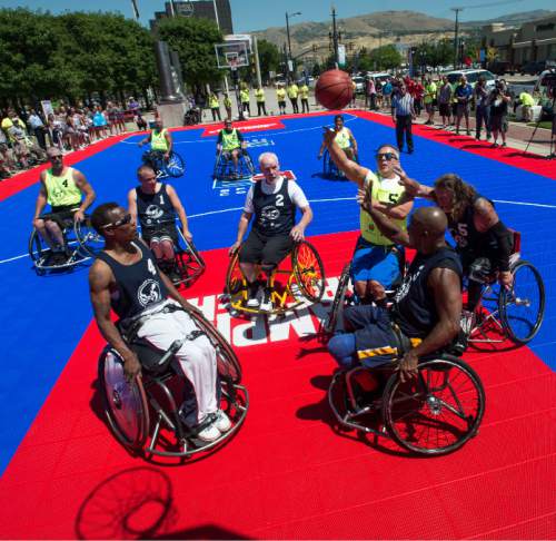 Steve Griffin  |  The Salt Lake Tribune
Jimmy Green fires a shot during an exhibition wheelchair basketball game at Vivint SmartHome Arena in Salt Lake City kicking off the 36th National Veterans Wheelchair Games are in Salt Lake City Monday June 27, 2016. This year over 625 athletes from all over the world will converge in Salt Lake City for the games June 27- July 2.
