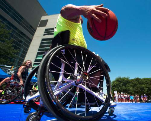 Steve Griffin / The Salt Lake Tribune

Jeff DeLeon dribbles up court during an exhibition wheelchair basketball game at Vivint SmartHome Arena in Salt Lake City kicking off the 36th National Veterans Wheelchair Games are in Salt Lake City Monday June 27, 2016. This year over 625 athletes from all over the world will converge in Salt Lake City for the games June 27- July 2.