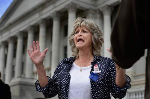 Scott Sommerdorf   |  The Salt Lake Tribune  
LaVoy Finicum's widow, Jeanette speaks about what she called her husband's "assasination" and describes that she feels he had his hands up when he was shot, as she was speaking to the media prior to a rally at the Utah State Capitol on Saturday.
