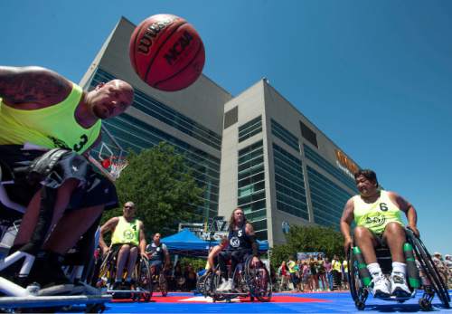Steve Griffin / The Salt Lake Tribune

Jeff DeLeon races after the ball during an exhibition wheelchair basketball game at Vivint SmartHome Arena in Salt Lake City kicking off the 36th National Veterans Wheelchair Games are in Salt Lake City Monday June 27, 2016. This year over 625 athletes from all over the world will converge in Salt Lake City for the games June 27- July 2.