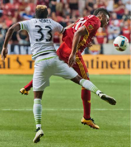 Michael Mangum  |  Special to the Tribune

Real Salt Lake midfielder Jordan Allen (70) heads the ball down in front of Seattle Sounders defender Joevin Jones (33) during their U.S. Open Cup match at Rio Tinto Stadium in Sandy, UT on Tuesday, June 28th, 2016. The match ended in a 1-1 draw with Seattle advancing after winning in a penalty kick shootout.