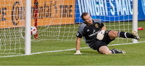 Michael Mangum  |  Special to the Tribune

Real Salt Lake goalkeeper Jeff Attinella dives on the pitch in the wrong direction as the game-winning penalty kick hits the back of the net for the Seattle Soudners during their U.S. Open Cup match at Rio Tinto Stadium in Sandy, UT on Tuesday, June 28th, 2016.