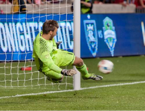 Michael Mangum  |  Special to the Tribune

Seattle Sounders goalkeeper Tyler Miller makes a save during a penalty kick shootout in their U.S. Open Cup match against Real Salt Lake at Rio Tinto Stadium in Sandy, UT on Tuesday, June 28th, 2016. The match ended in a 1-1 draw with Seattle advancing after winning in a penalty kick shootout.