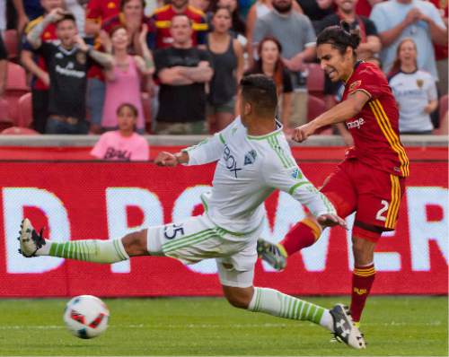 Michael Mangum  |  Special to the Tribune

Real Salt Lake defender Tony Beltran (2) takes a hard shot in front of an onrushing Seattle Sounders defender Tony Alfaro (29) during their U.S. Open Cup match at Rio Tinto Stadium in Sandy, UT on Tuesday, June 28th, 2016.