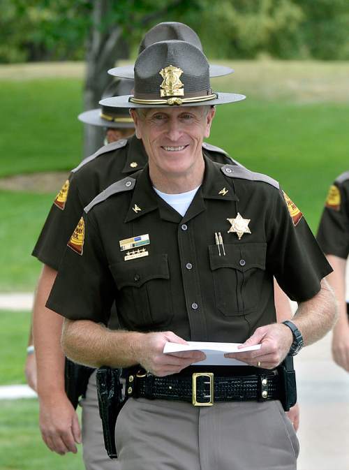 Al Hartmann  |  The Salt Lake Tribune 
New Utah Highway Patrol Col. Michael Rapich walks to a news conference in Taylorsville Wed. June 29.  He expects the Fourth of July weekend to have the heaviest traffic of the year, and the UHP is hoping to minimize fatalities.  They will be out in force throughout the state but are paying attention to agressive driving along the Wasatch front.  Unmarked cars will be out too.
