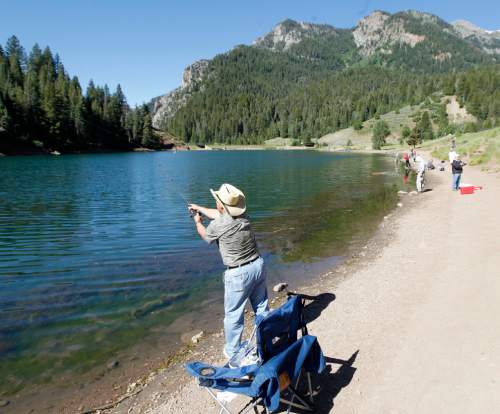 Al Hartmann  |  The Salt Lake Tribune

Fisherman cast into the clear water of Tibble Fork Reservoir in American Fork Canyon Friday June 21, 2013.