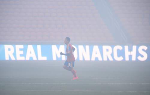 Steve Griffin  |  The Salt Lake Tribune

Sebastian Saucedo of Real Monarchs takes the field as smoke from pre game fireworks fills the stadium as the Monarchs  start their home schedule against the Portland Timbers 2  at Rio Tinto Stadium in Sandy, Wednesday, April 8, 2015.
