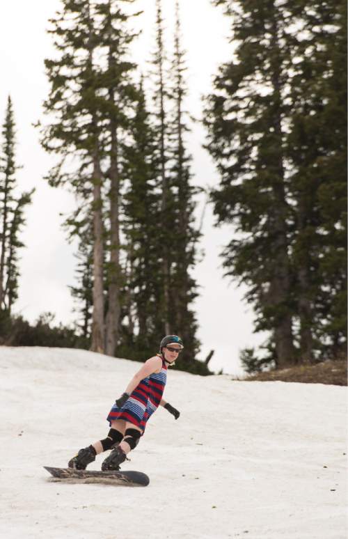 Leah Hogsten  |  The Salt Lake Tribune
"I guess I never figured I'd get this far, " said Salt Lake City snowboarder Becky Nix on Saturday, July, 2, 2016, of her 120th consecutive month of snowboarding. "It's encouraged me to go on adventures that I normally wouldn't have done."  Nix completed her 10th year on the Sugarbowl run at Alta Ski resort. It all started during a casual snowboarding invitation from a fellow graduate student at the University of Colorado, who had her own streak to maintain and was looking for a companion for the summertime outing.