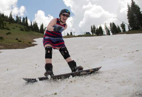 Leah Hogsten  |  The Salt Lake Tribune
"I guess I never figured I'd get this far, " said Salt Lake City snowboarder Becky Nix on Saturday, July, 2, 2016, of her 120th consecutive month of snowboarding. "It's encouraged me to go on adventures that I normally wouldn't have done."  Nix completed her 10th year on the Sugarbowl run at Alta Ski resort. It all started during a casual snowboarding invitation from a fellow graduate student at the University of Colorado, who had her own streak to maintain and was looking for a companion for the summertime outing.