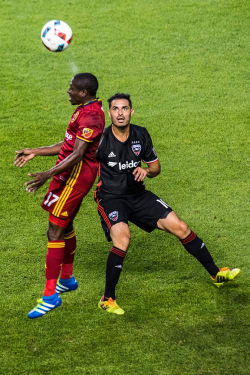 Chris Detrick  |  The Salt Lake Tribune
Real Salt Lake midfielder Demar Phillips (17) and D.C. United forward Fabian Espindola (10) go for the ball during the game at Rio Tinto Stadium Friday July 1, 2016.
