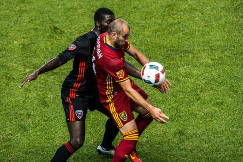 Chris Detrick  |  The Salt Lake Tribune
D.C. United defender Kofi Opare (6) and Real Salt Lake forward Yura Movsisyan (14) go for the ball during the game at Rio Tinto Stadium Friday July 1, 2016.