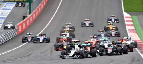 Mercedes driver Lewis Hamilton of Britain leads the field after the start during the Formula One Grand Prix, at the Red Bull Ring in racetrack, in Spielberg, Austria, Sunday, July. 3, 2016. (AP Photo/Kerstin Joensson)