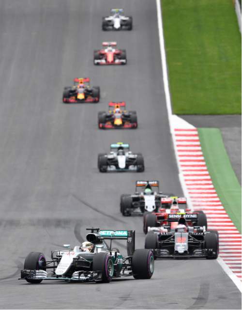 Mercedes driver Lewis Hamilton of Britain leads during the Formula One Grand Prix, at the Red Bull Ring in racetrack, in Spielberg, Austria, Sunday, July. 3, 2016. (AP Photo/Kerstin Joensson)