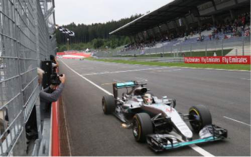 Mercedes driver Lewis Hamilton of Britain crosses the finish line to win the Austrian Formula One Grand Prix at the Red Bull Ring racetrack, in Spielberg, southern Austria, Sunday, July 3, 2016. (AP Photo/Ronald Zak, Pool)