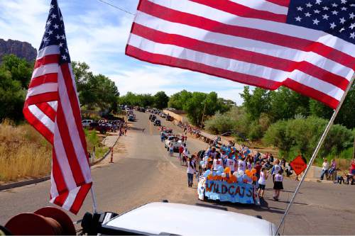 Trent Nelson  |  The Salt Lake Tribune
Onlookers on the route as the Colorado City and Hildale Fourth of July Parade makes its way down Central Street in Hildale, UT, and Colorado City, AZ, Saturday July 2, 2016.