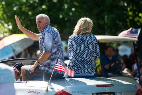 Chris Detrick  |  The Salt Lake Tribune
BYU basketball coach Dave Rose waves to the crowd during the annual Freedom Festival Grand Parade in downtown Provo Monday July 4, 2016.