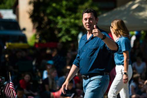Chris Detrick  |  The Salt Lake Tribune
Congressman Jason Chaffetz give a thumbs up to the crowd during the annual Freedom Festival Grand Parade in downtown Provo Monday July 4, 2016.