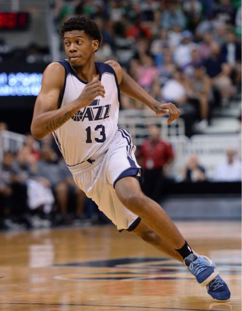 Steve Griffin / The Salt Lake Tribune

Utah Jazz guard Tyrone Wallace cuts to the basket during the Jazz versus Spurs during summer league game at the Vivint Smart Home Arena in Salt Lake City Monday July 4, 2016.
