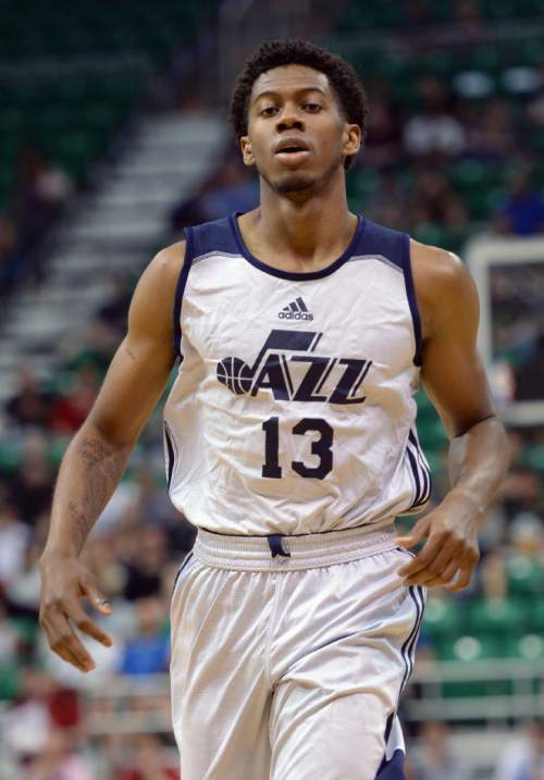 Steve Griffin / The Salt Lake Tribune

Utah Jazz guard Tyrone Wallace cuts to the basket during the Jazz versus Spurs during summer league game at the Vivint Smart Home Arena in Salt Lake City Monday July 4, 2016.