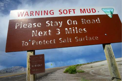 Scott Sommerdorf   |  The Salt Lake Tribune  
One of the numerous signs warning motorists to stay off the salt flats near the Bonneville Speedway, Friday, May 27, 2016.