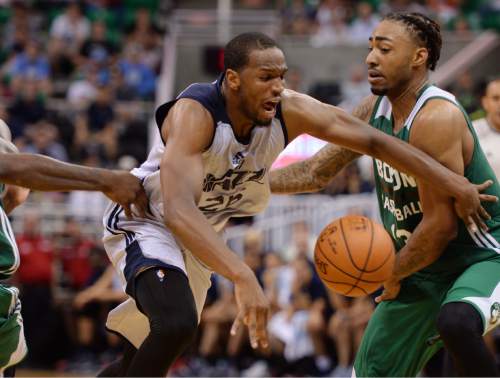 Steve Griffin / The Salt Lake Tribune

Utah Jazz guard Dionte Christmas gets fouled as he drives to the basket during the Jazz versus Celtics summer league game at the Vivint Smart Home Arena in Salt Lake City Tuesday July 5, 2016.