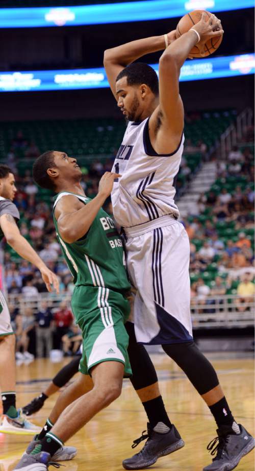 Steve Griffin / The Salt Lake Tribune

Utah Jazz forward Trey Lyles holds the ball above his head as Boston's Malcolm Miller tries to guard him during the Jazz versus Celtics summer league game at the Vivint Smart Home Arena in Salt Lake City Tuesday July 5, 2016. Lyles was called for an offensive foul on the play.