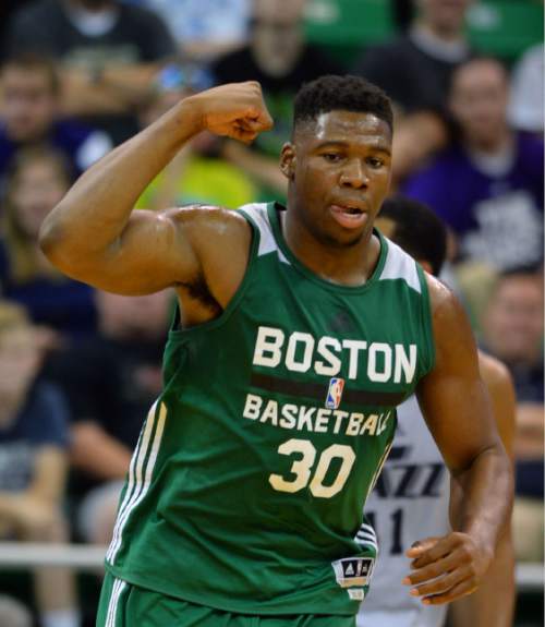 Steve Griffin / The Salt Lake Tribune

Boston forward Guerschon Yabusele flexes his muscle after throwing down a dunk during the Jazz versus Celtics summer league game at the Vivint Smart Home Arena in Salt Lake City Tuesday July 5, 2016.