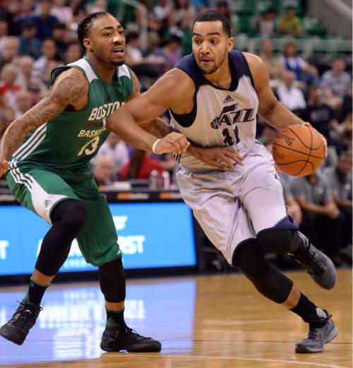 Steve Griffin / The Salt Lake Tribune

Utah Jazz forward Trey Lyles drives past Boston's James Young during the Jazz versus Celtics summer league game at the Vivint Smart Home Arena in Salt Lake City Tuesday July 5, 2016. Lyles was called for an offensive foul on the play.
