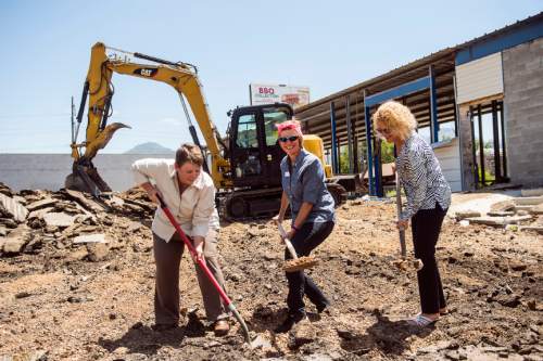 Chris Detrick  |  The Salt Lake Tribune
Mayor Jackie Biskupski, Council Member Lisa Adams, and Sugar House Community Council Chair Amy Barry shovel dirt during a press conference at Ute Car Wash in Sugar House Wednesday July 6, 2016.
