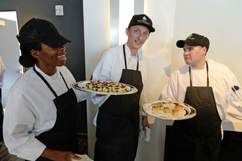 Francisco Kjolseth | The Salt Lake Tribune
Students Saba Wilson, Kurt Farnes and Brad Smythe get ready to serve appetizers they've made for the  Culinary Command cocktail party. The program offers veterans and active military free culinary training.
