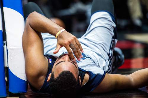 Chris Detrick  |  The Salt Lake Tribune
Utah Jazz's Trey Lyles (41) remains on the ground after being fouled during the game at the Huntsman Center Thursday July 7, 2016. Philadelphia won the game 86-75.