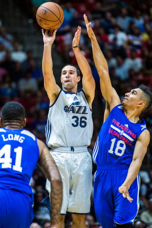 Chris Detrick  |  The Salt Lake Tribune
Utah Jazz's Aaron Craft (36) shoots over Philadelphia 76ers' Maodo Lo (18) during the game at the Huntsman Center Thursday July 7, 2016.