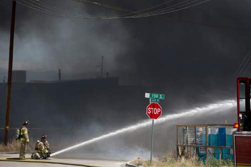 Lennie Mahler  |  The Salt Lake Tribune

Emergency crews respond to a 5-alarm fire at a commercial scrap yard in Salt Lake City on Friday, July 8, 2016.