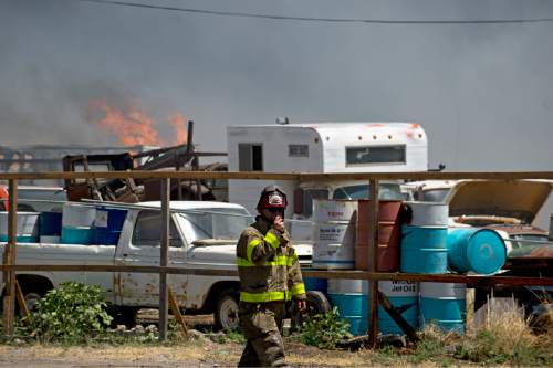 Lennie Mahler  |  The Salt Lake Tribune

Emergency crews respond to a 5-alarm fire at a commercial scrap yard in Salt Lake City on Friday, July 8, 2016.