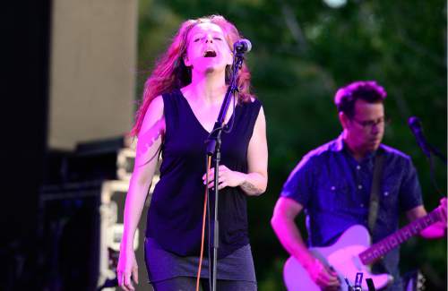 Scott Sommerdorf   |  The Salt Lake Tribune  
Neko Case sings as the indie-folk collaboration collectively known as case/lang/veirs, performs at Red Butte Garden Amphitheatre, Friday, July 8, 2016. The trio, avant-rock singer Neko Case, alt-country pioneer k.d. lang and folk artist Laura Veirs, are touring this summer in support of their self-titled album released in mid-June. Loch Lomond opened the show.