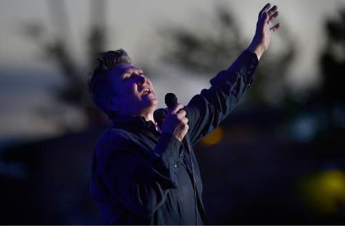 Scott Sommerdorf   |  The Salt Lake Tribune  
k.d. lang sings "Helpless" as the indie-folk collaboration collectively known as case/lang/veirs, performs at Red Butte Garden Amphitheatre, Friday, July 8, 2016. The trio, avant-rock singer Neko Case, alt-country pioneer k.d. lang and folk artist Laura Veirs, are touring this summer in support of their self-titled album released in mid-June. Loch Lomond opened the show.