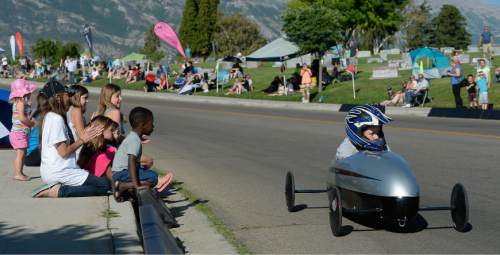 Francisco Kjolseth | The Salt Lake Tribune
Kids compete in the 6th annual American Fork Gravity Soap Box Derby on Thursday July 7th, 2016.