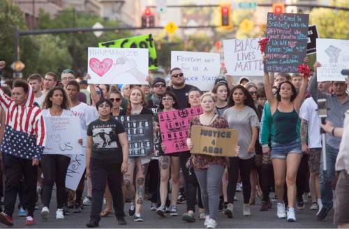Rick Egan  |  The Salt Lake Tribune

Hundreds of protesters march from the Salt Lake City Public Safety Building square,  o march to Sim Gill's office, during an emergency protest against police brutality to support the protests in Baton Rouge and St. Paul, Saturday, July 9, 2016.