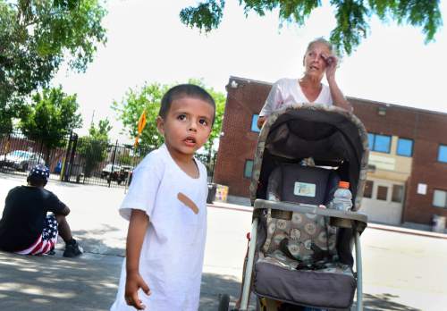 Scott Sommerdorf   |  The Salt Lake Tribune  
Kathy Maestas is homeless along with her 3-year-old grandson, Navin, on Rio Grande Street near the Salt Lake Road Home, Friday, July 8, 2016.