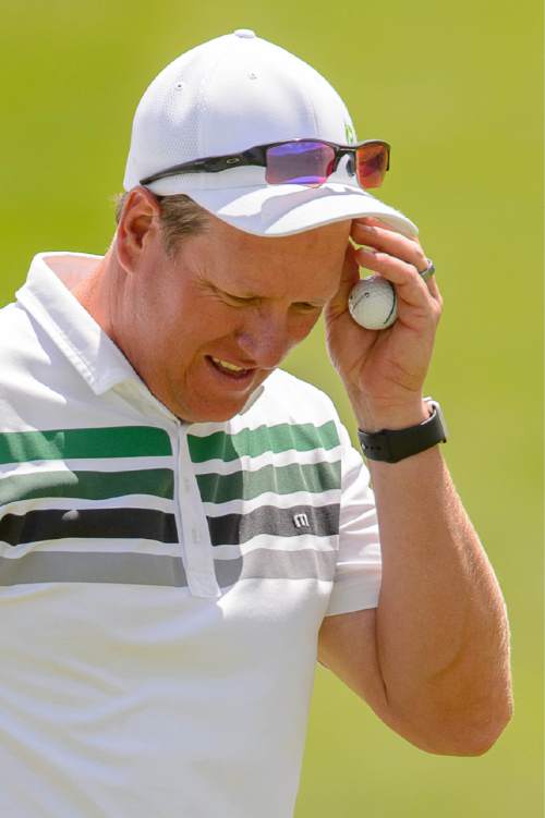 Trent Nelson  |  The Salt Lake Tribune
Darrin Overson reacts to a putt in the championship match of the 117th Utah State Amateur golf tournament at Soldier Hollow Golf Course in Midway, Saturday July 11, 2015.